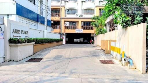 Entrance to a residential building with driveway