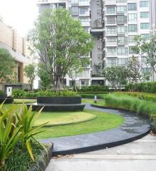 Modern apartment building with landscaped garden