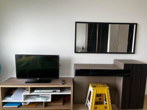 Living room with TV and console