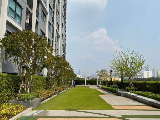 Outdoor area with landscaped garden and building