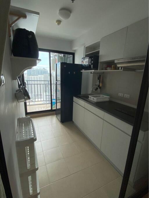 Modern kitchen with balcony view