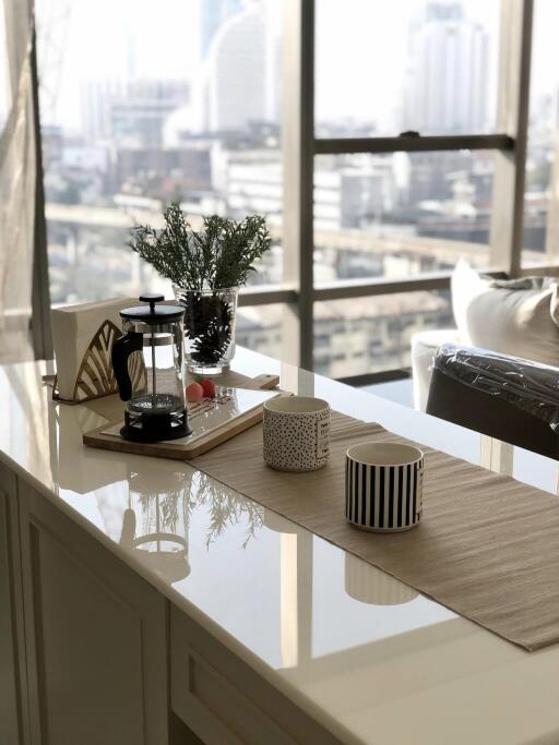 Modern kitchen with island and city view