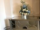 decorative console table with floral arrangement