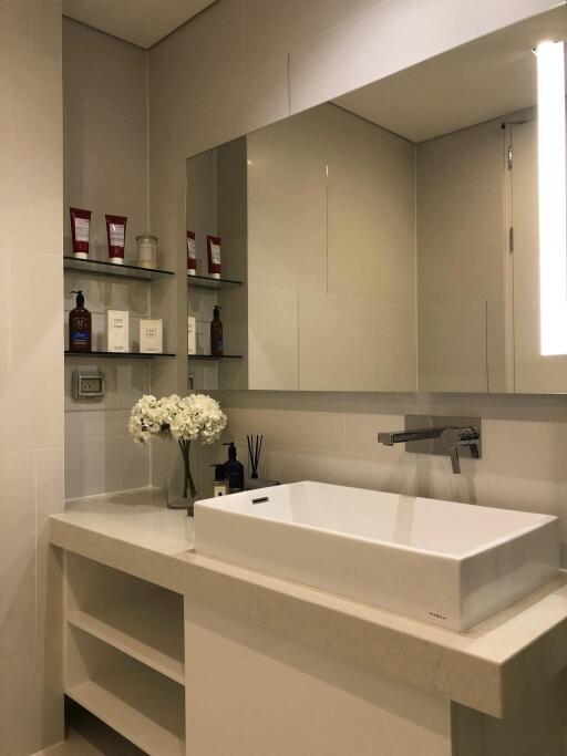 Modern bathroom with vanity and mirror