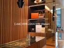 Contemporary hallway with wooden panels and glass shelving