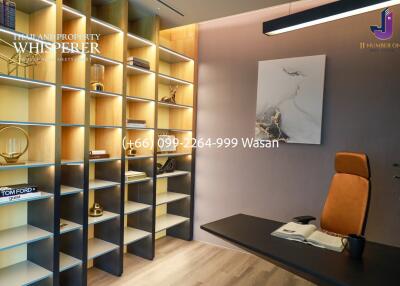 Modern office with shelving and desk