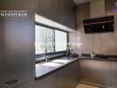 Modern kitchen with large window and sleek cabinets