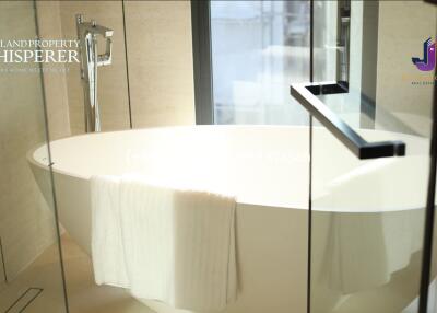 Modern bathroom with a freestanding bathtub