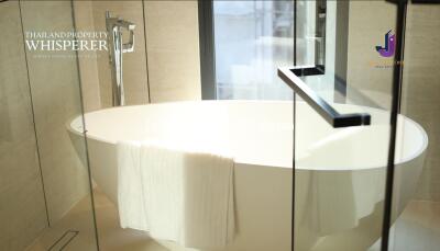 Modern bathroom with a freestanding bathtub