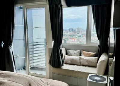 Modern bedroom with a city view