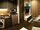 Modern living area with integrated laundry and kitchenette