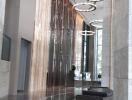 Modern and luxurious lobby with marble flooring and elegant lighting fixtures