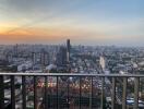 City view from balcony at sunset