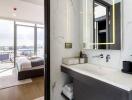 Modern bedroom and bathroom with city view