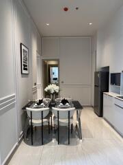 Modern dining area with a four-seater table and elegant setup