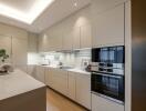 Modern kitchen with sleek cabinets and appliances