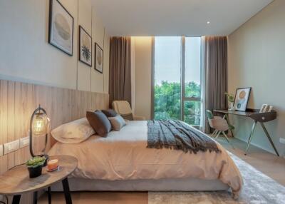 Modern bedroom with large window and natural light