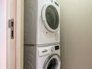 Stacked washer and dryer in a small laundry room