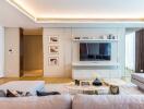 Spacious and modern living room with wall-mounted TV and stylish decor