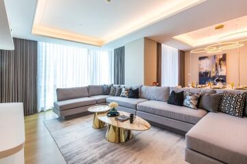 modern living room with large sectional sofa and coffee tables