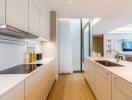 Modern kitchen with white cabinets and island