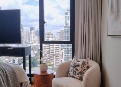 Bedroom with a view of the city skyline