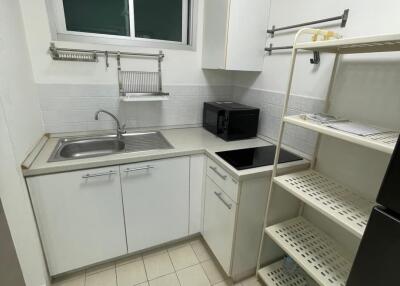 Compact but fully-equipped kitchen with modern appliances