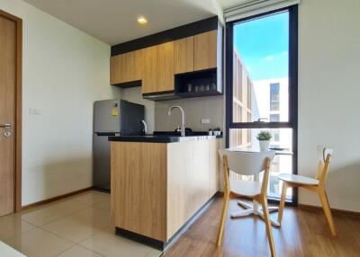 Modern kitchen with adjacent dining area