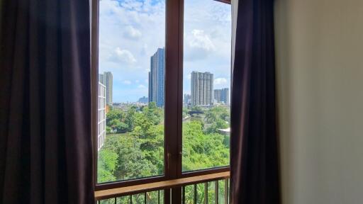 Bedroom window with city view