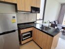 Modern kitchen area with adjacent living space