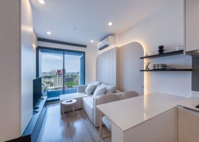 Modern living room with large window and city view