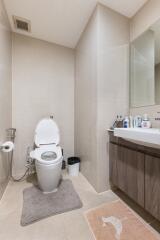 Modern bathroom with a toilet and sink