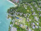 Aerial view of a hillside property complex overlooking the ocean