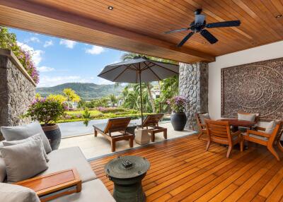 Spacious patio with outdoor furniture and scenic view