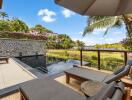 Luxury outdoor area with pool and lounge chairs