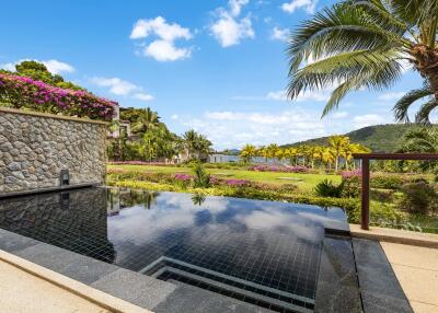 Outdoor area with infinity pool and scenic view