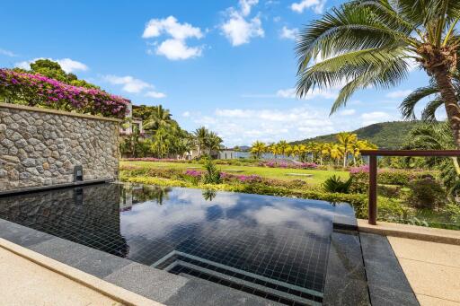 Outdoor area with infinity pool and scenic view