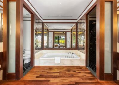 Modern luxurious bathroom with wooden accents
