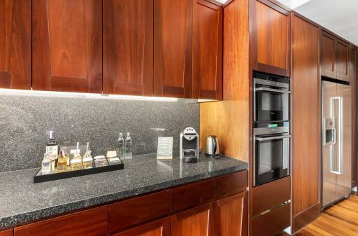 Modern kitchen with wooden cabinets and built-in appliances