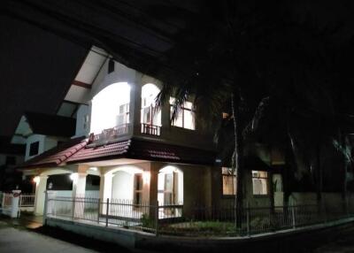 Illuminated front view of a residential house at night