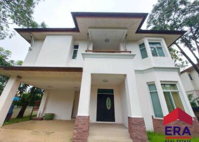 Exterior view of a two-story house with a small front porch