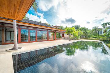 Luxury outdoor pool area with surrounding patio