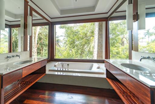 Luxurious bathroom with a large bathtub and double sinks