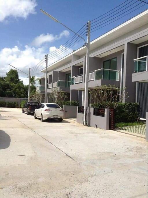 Modern townhouse building with driveway