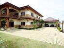 Two-story house with driveway and garage