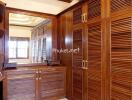 Spacious wooden wardrobe area