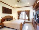 Bedroom with wooden furniture and decor