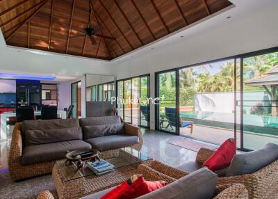 Spacious living area with pool view