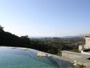 Scenic view from a pool-side area with surrounding greenery