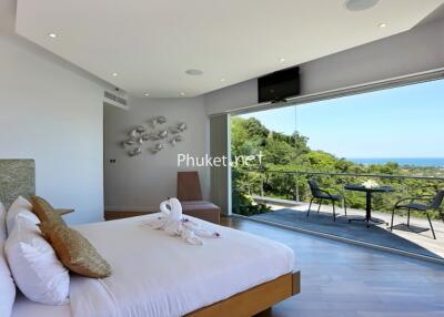 Luxurious bedroom with a stunning panoramic view